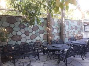 اجرای سنگ لاشه و مالون بروی بدنه دیوار