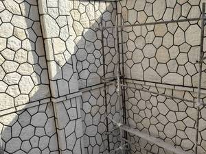 اجرای سنگ مالون روی دیوار محوطه