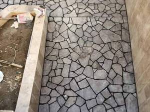اجرای سنگ لاشه کف حیاط 