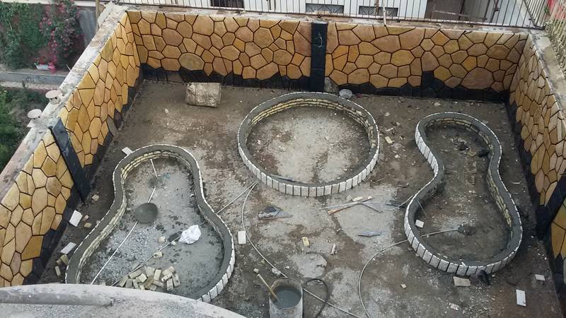 اجرای نمای محوطه و کف حیاط با سنگ لاشه