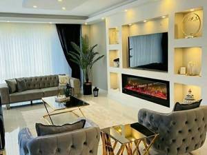 قیمت شومینه برقی زیر تلویزیون