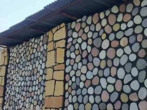 قیمت اجرای سنگ لاشه دیوار مالون غولبه