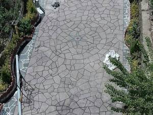 کف سازی حیاط با سنگ لاشه و سنگ مالون