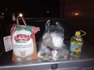 توزیع بسته‌های غذایی جهت خانواده های تحت پوشش گروه
