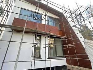 اجرای ترمووود نما پروژه ویلایی فاز یک مهرشهر