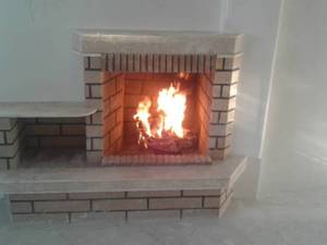 ساخت شومینه هیزومی گازی  سنگی در کلاچای گیلان