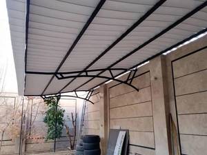 طراحی و ساخت سایبان بدون پایه مزاحم در کرمان