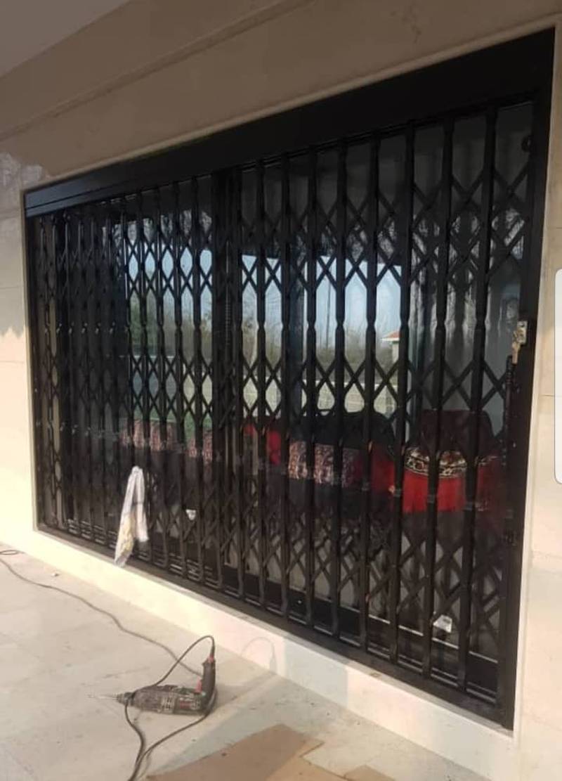 طراحی و نصب درب اکاردیونی رنگ کورهای در رشت