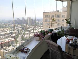 طراحی و اجرا شیشه متحرک بالکنی در تهران