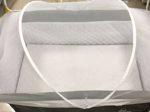 گهواره کنار تخت مادر
