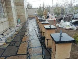 اجرای سنگ لاشه برای محوطه سازی کف ستون در دماوند