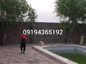 اجرای سنگ مالون سنگ لاشه بر روی  دیوار و کف محوطه ویلا
