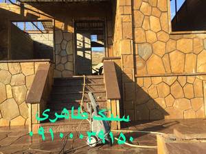 اجرای نمای ساختمان سنگ لاشه به صورت فرزی دماوند