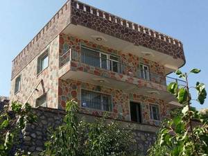 نمای سنگی ساختمان با اجرای سنگ مالون طبیعی